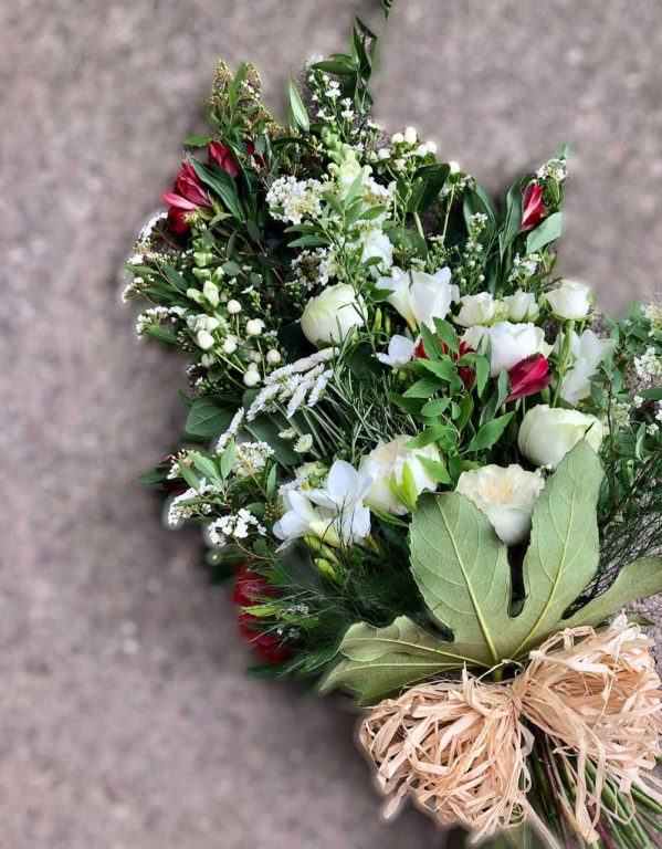 Hand tied funeral flower bouquet